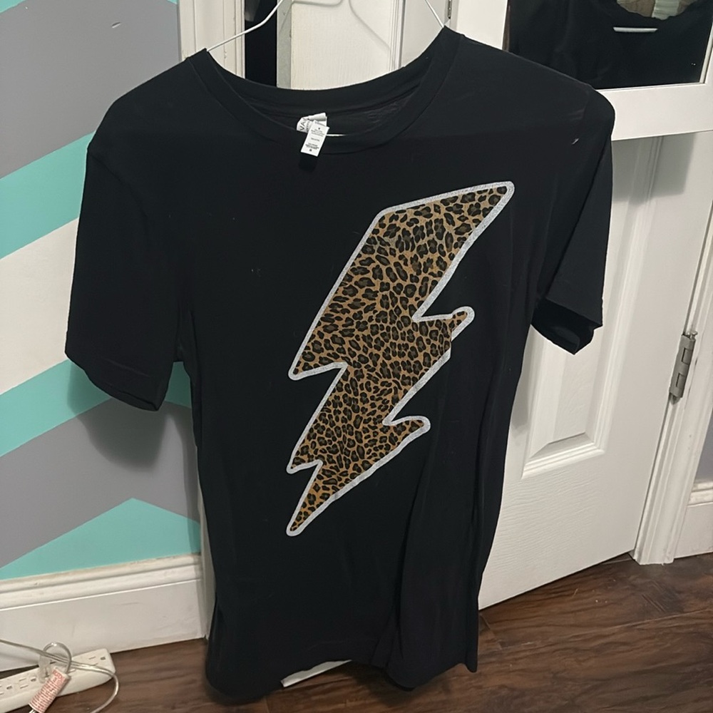 Black cheetah print lighting bolt tee shirt for sale.